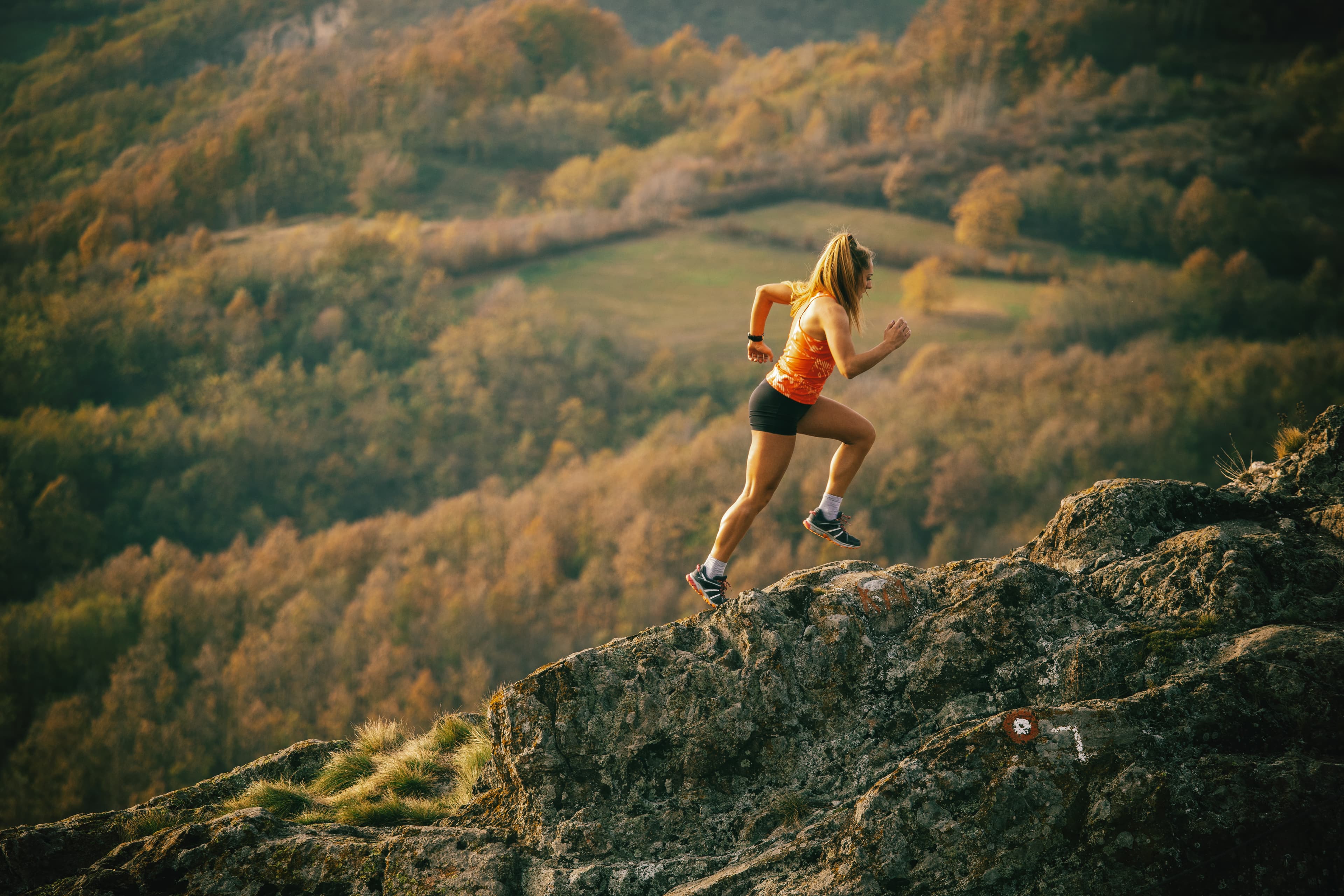 Woman training outdoors as part of her improvement plan